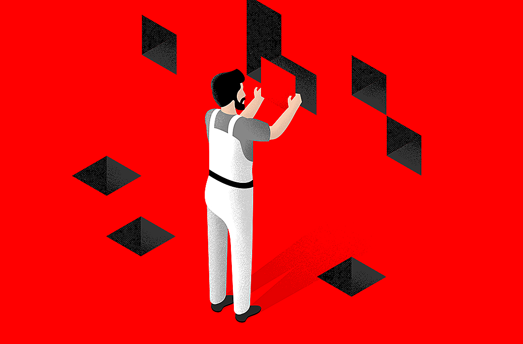 Man standing with red tile on red wall